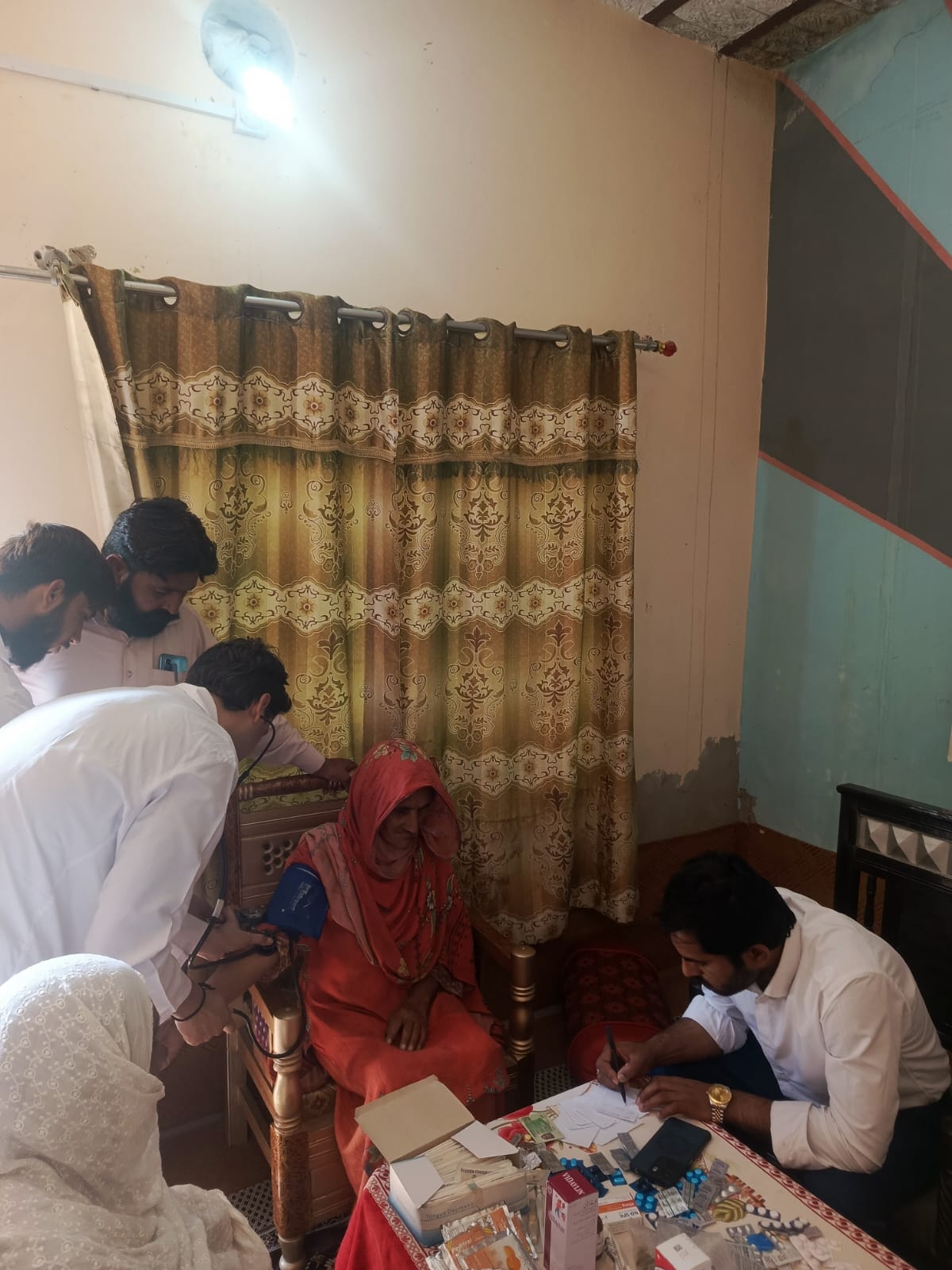 Medicines being distributed at the camp